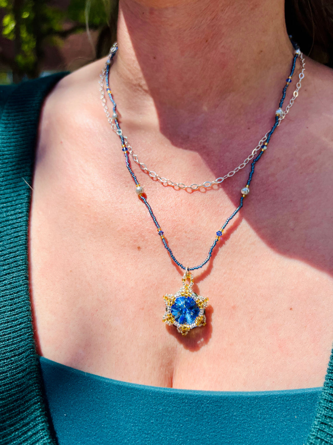 Handwoven Lotus Flower Necklace | Blue Sapphire Crystal & Sterling Silver Em'z Blendz Soap Co.