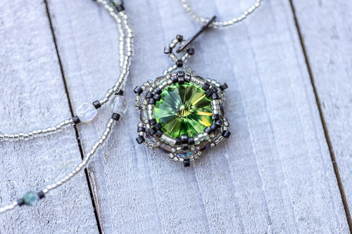Lotus Star Necklace | Handwoven Peridot Green Crystal & Silver Em'z Blendz Soap Co.
